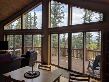 large windows in a house in the mountains  Dirty windows in a house. Select Window Cleaning USA, int