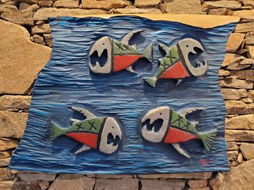Surfboard Taxidermy carving of Piranhas by artist Michael Clineman.