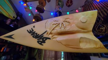 Surfboard Taxidermy carving of Diamondhead by artist Michael Clineman.