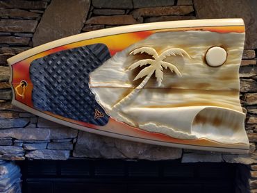 Surfboard Taxidermy carving of a Beach Scene by artist Michael Clineman.