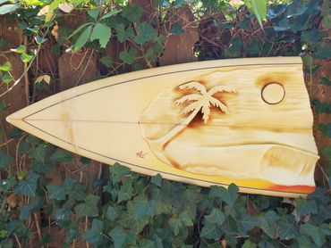 Surfboard Taxidermy carving of a Beach Scene by artist Michael Clineman.
