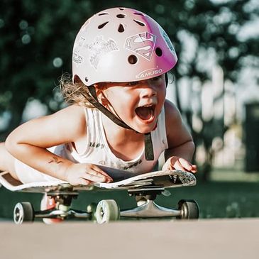Girl excited on a skateboard