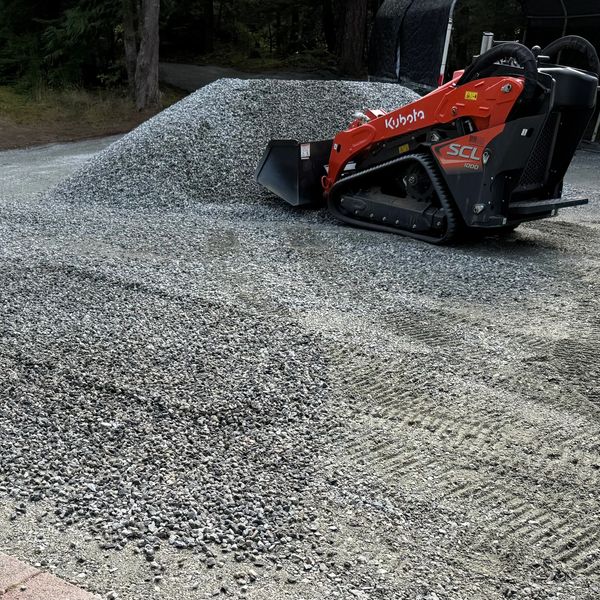 Pothole repairs and driveway gravel refurbishment
