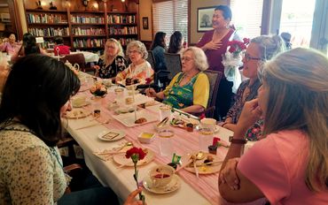 We visited Oakmont Senior Living at their Mother's Day tea party, passed out flowers and entertained