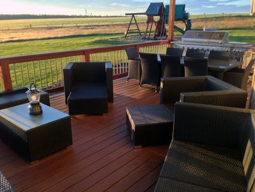 A deck and railing installation for safe, stylish, and functional outdoor living.