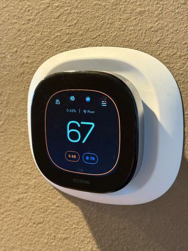 A smart home upgrade with an Ecobee thermostat installed for energy efficiency and air quality.