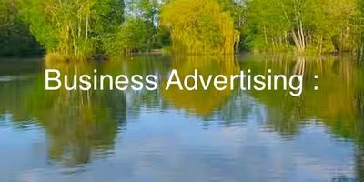 Calm lake with trees and text 'Business Advertising:'.