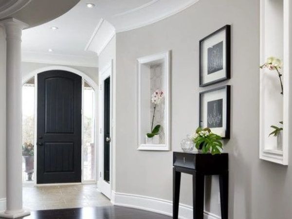 Distinguished Front entrance of home interior painted by Southern Home Handyman in light gray.