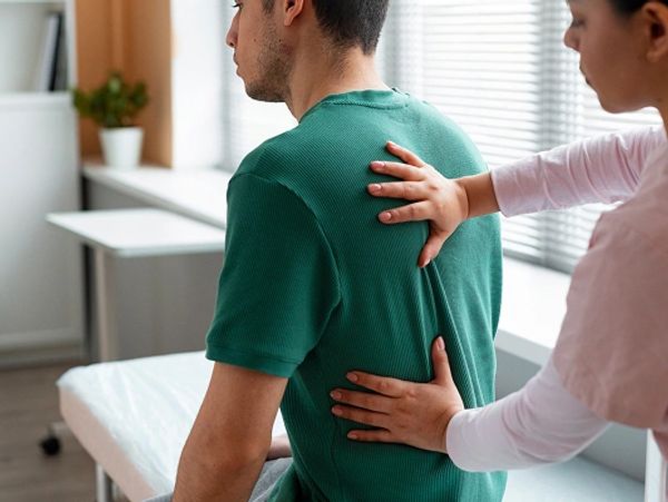 doctor-helping-patient-rehabilitation