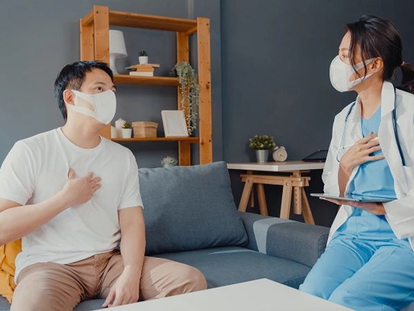 young-asia-female-physician-doctor-wear-face-mask-using-digital-tablet-sharing-good-health-test-news