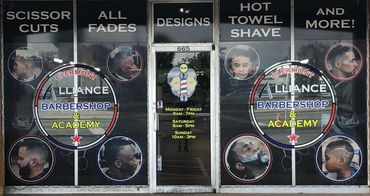 Barbershop storefront showcasing haircut styles, services, and business hours.