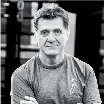 Man trainer wearing T shirts and looking ahead