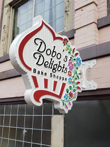 projecting signs, blade signs, 3d signs, hdu sign, woodgrain signs, dimensional sign