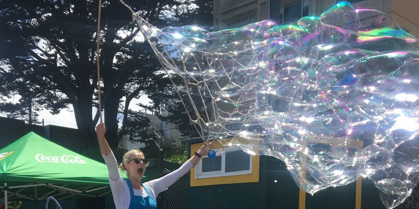 Outdoor bubble playtime! Interactive bubble show for children.