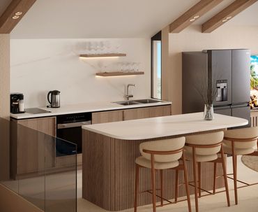 Modern kitchen with wooden accents, island seating, and stainless steel appliances.