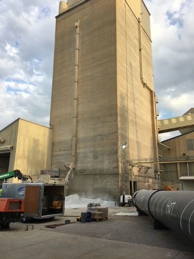 10 story tower and Wetblasting equipment at glass plant in Tulare, CA