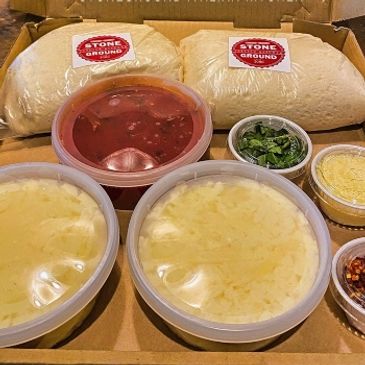 Make at home pizza kit, fresh dough, fresh cheese, sauce and toppings