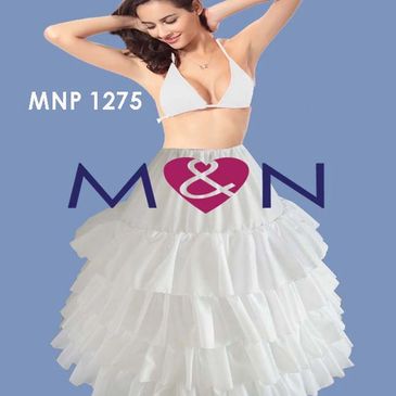 Woman modeling white ruffled skirt and white bikini top.