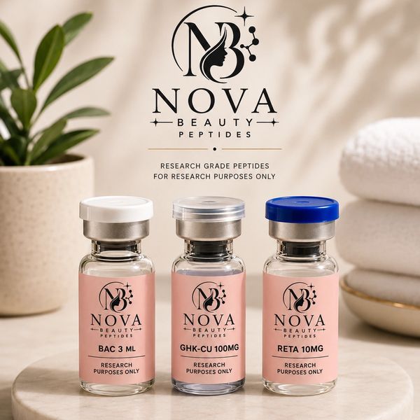 Three research-grade peptide vials from Nova Beauty Peptides displayed on a marble surface.