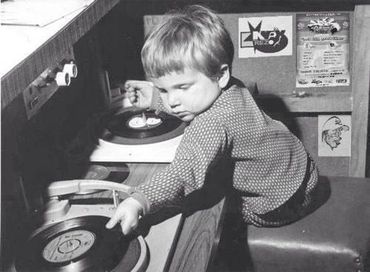 Jim Morrison at his parents record player.