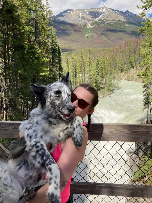 auntie Royce holding Mila her dog