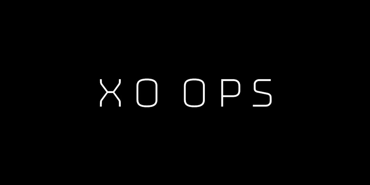 Text saying 'XO OPS' on black background.