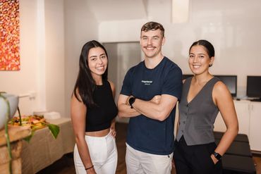 Team branding photography Melbourne — group in workplace setting