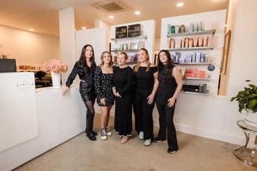 Team branding photography Melbourne — group in workplace setting