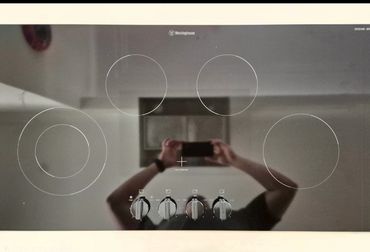 Induction oven cooktop