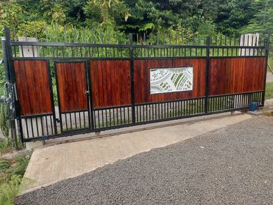 Automatic Sliding Gate, with inbuilt door for single person entrance.