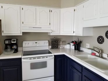 navy blue and white freshly painted kitchen
