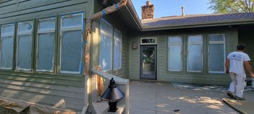 Painting process for green cedar house in hot Springs, AR