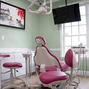Harmony Dental and Orthodontics red dental chair