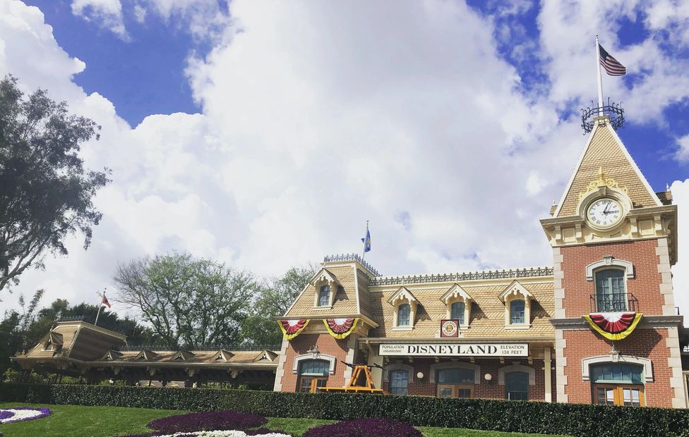 Disneyland Main Street Station with Mickey Mouse flowers on a sunny afternoon