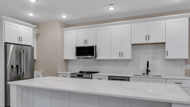 Kitchen with stainless appliances, N Jefferson St student townhome