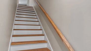 Staircase inside N Jefferson St student townhome