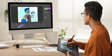 Artist designing 2D and 3D animation on digital tablet, delivering immersive brand visuals.