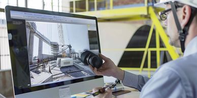 Architectural videographer capturing the highlights of buildings and spaces