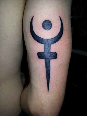 Tribal symbol tattoo.