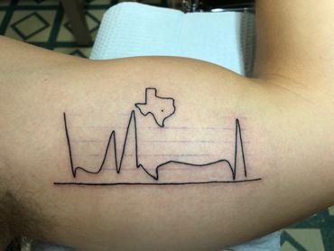 Texas outline tattoo.