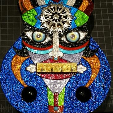 stained-glass-art-tribal-mask-colorful ukelele-textured-glass