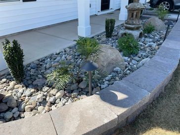 River rock, shrub and retaining wall install