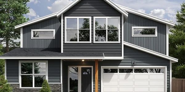 Modern two-story house with dark gray siding and white trim.