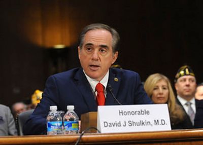 David J. Shulkin speaking at a formal hearing.