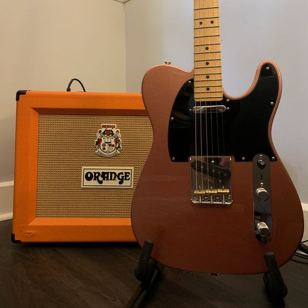 Electric guitar with Orange amplifier.