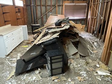 Construction debris removal by Collins Cleanup Services after a home renovation project in San Juan