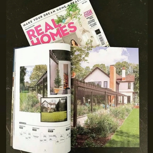 Real Homes magazine featuring a house and garden renovation with Thin coat render