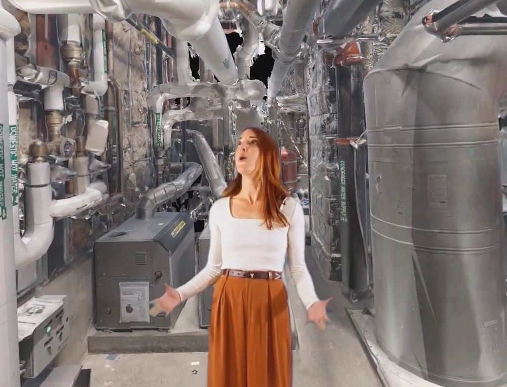 Jen with makeSEA reacting to immersive digital twin of a building's core facilities.