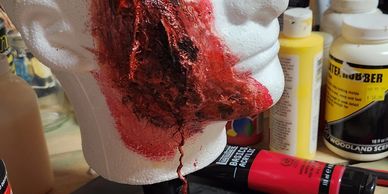 Liquid latex, cheesecloth support, cotton, dried, then painted with latex and acrylic paint mix.