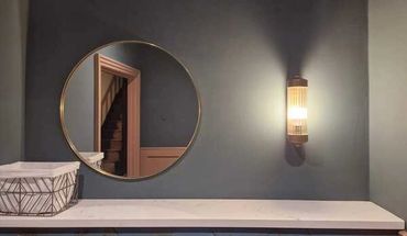 Mirror and light fitting I fitted in a cloakroom.